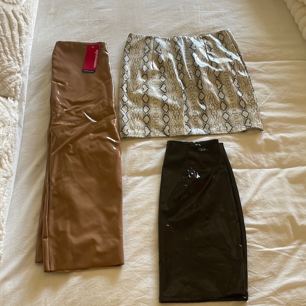 set of three faux leather skirts. Two mini, one midi all in perfect condition.